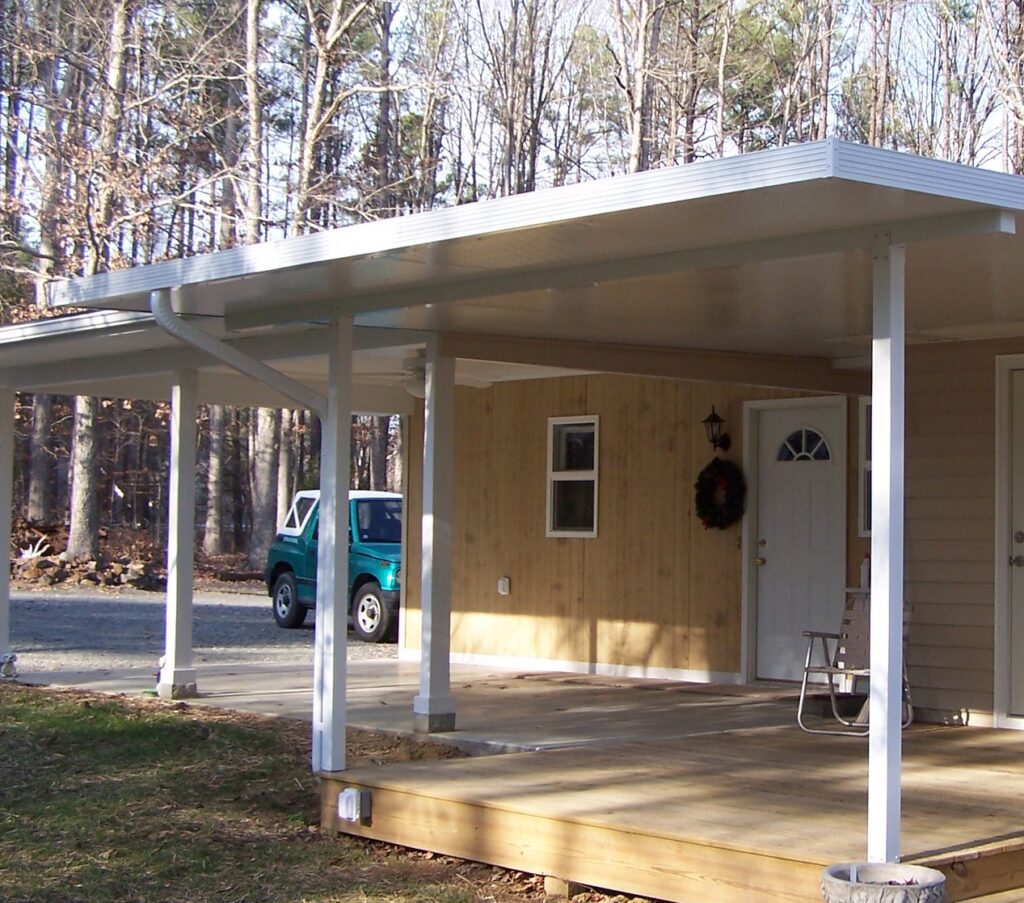 Detached Garage with Covered Patio Beside It